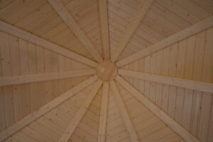 Inside of the roof of the cabin, showing wooden structure